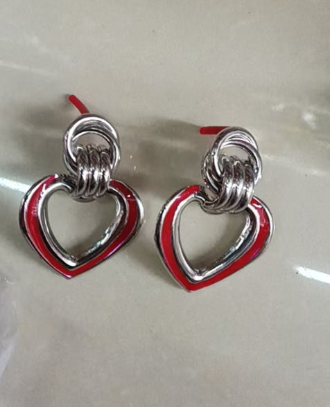Women’s earrings in modern heart design