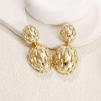 Women's earrings in artistic, structured design