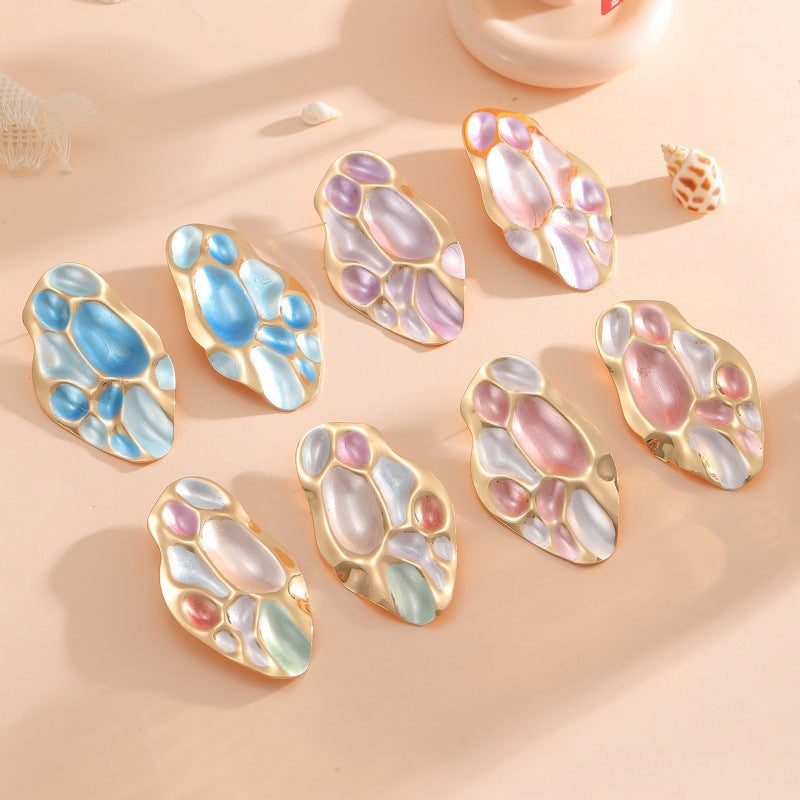 Ladies ear clips with elaborate, colorful shell design