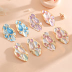 Ladies ear clips with elaborate, colorful shell design