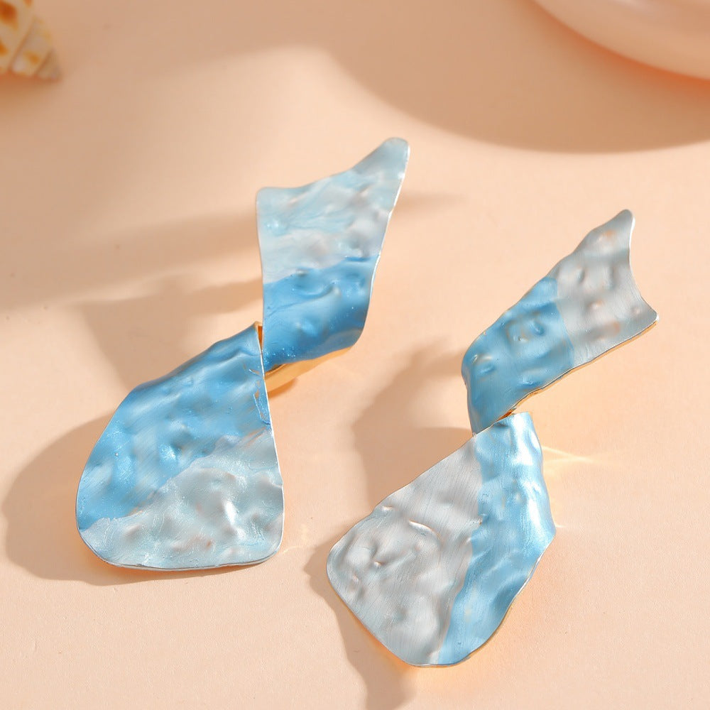 Ladies earrings in modern disc design