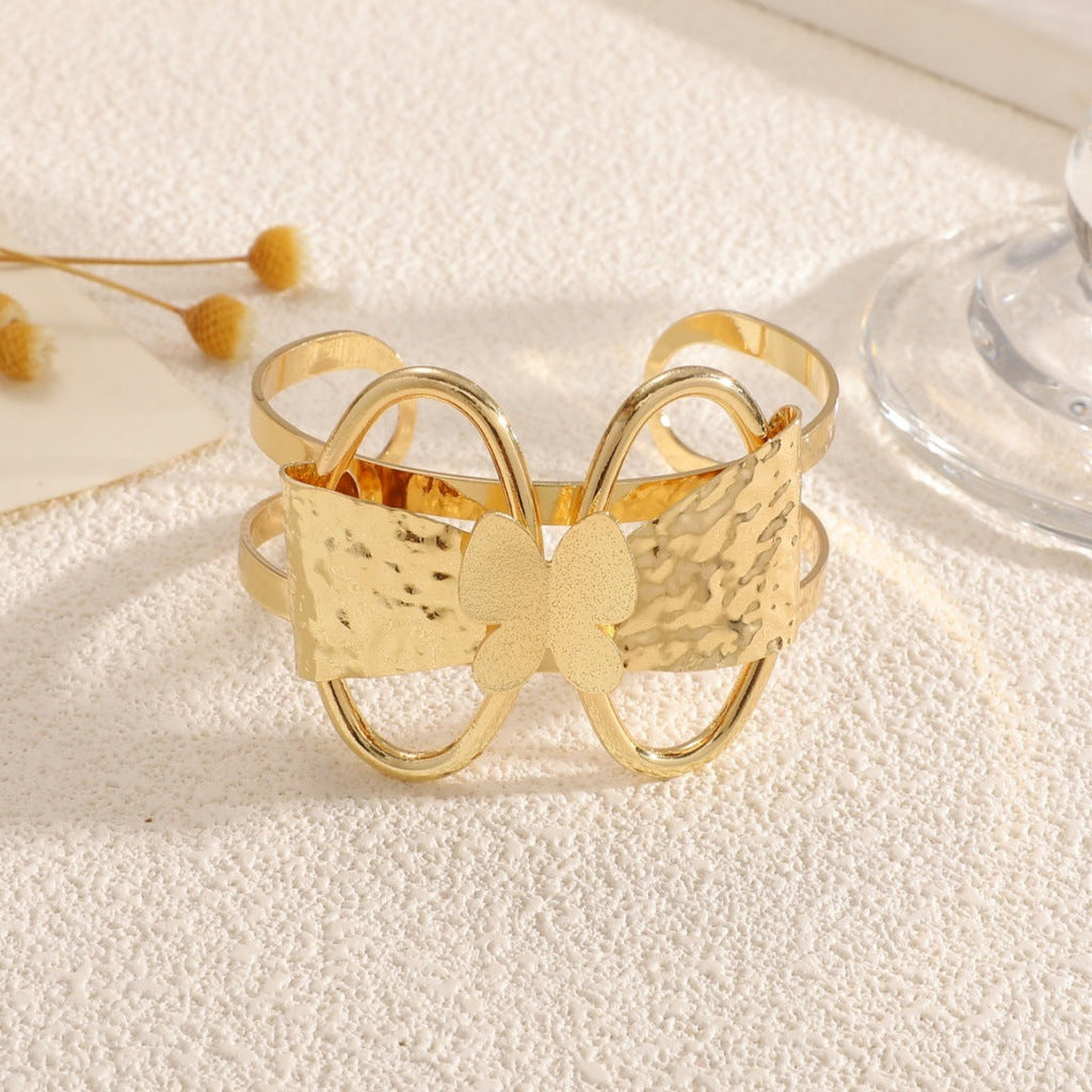 Women's bracelet with ornate butterfly design