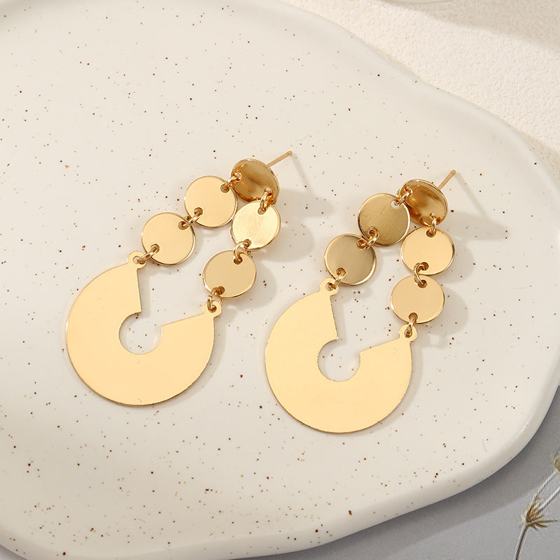 Women's elegant earrings with rustic, folded design