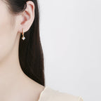 Ladies earrings with sparkling crystals and high-quality gold plating