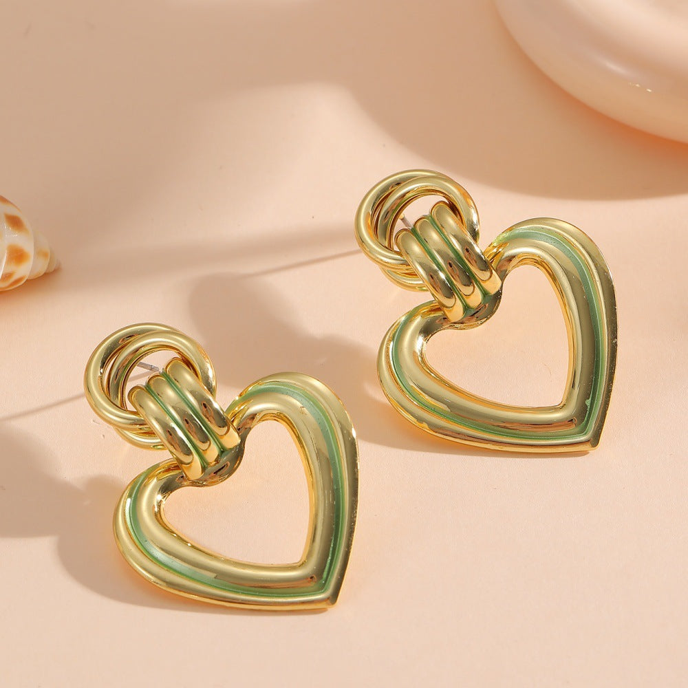Women’s earrings in modern heart design