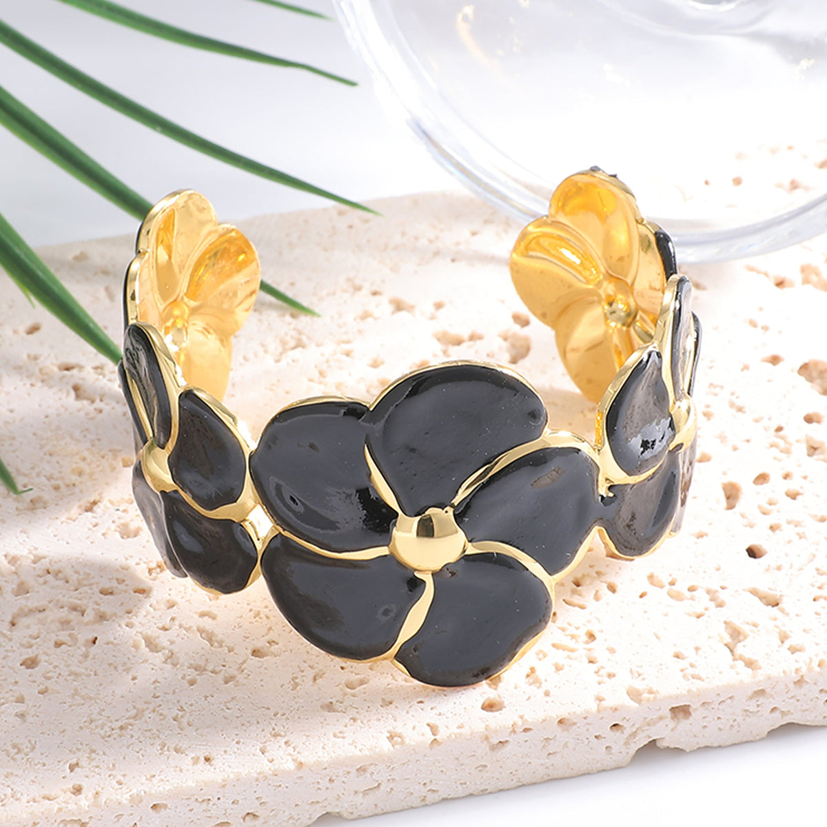 Ladies cuff bracelet with elaborate flower pattern