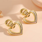 Women’s earrings in modern heart design
