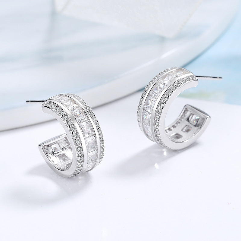 Women's stud earrings with elegant crystal and zirconia embellishment