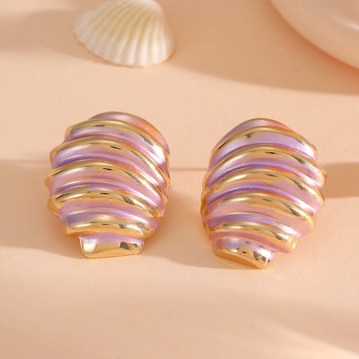 Women's ear clips in maritime shell design
