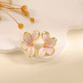 Women's ear clips in elegant floral design with a glossy coating