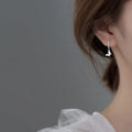 Ladies earrings with elegant butterfly design and sparkling details
