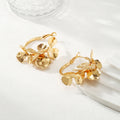 Ladies Creoles with artistic floral ornament