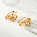 Ladies Creoles with artistic floral ornament