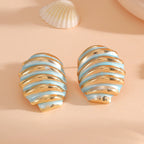 Women's ear clips in maritime shell design