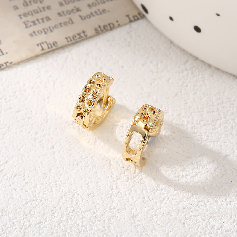 Women's hoop earrings with modern, textured design