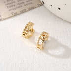 Women's hoop earrings with modern, textured design