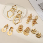 Women's elegant earrings with rustic, folded design
