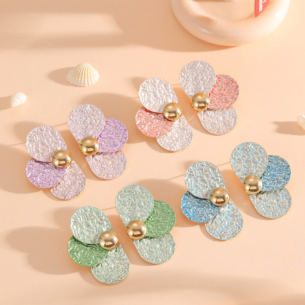 Women's ear clips in elaborate floral pattern