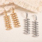 Ladies Hanging Earrings in Modern Spiral Design