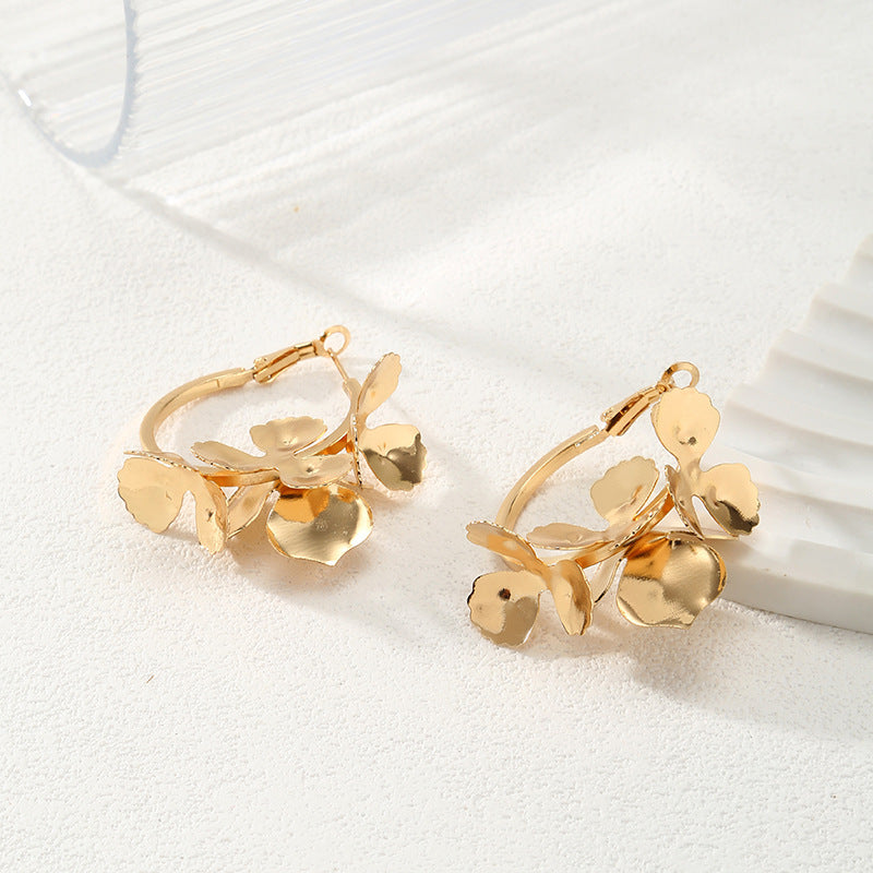 Ladies Creoles with artistic floral ornament