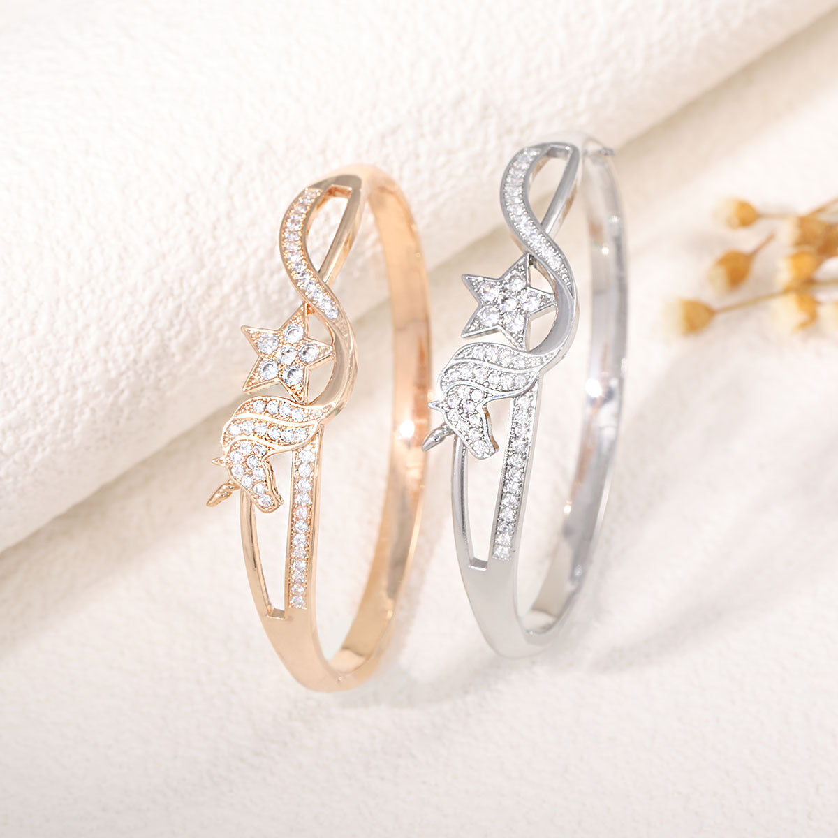 Ladies bracelet with elaborate infinity symbol and sparkling zirconia