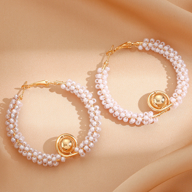 Women’s hoops with artistic pearl design