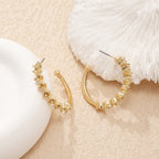 Ladies hoop earrings with intricate structures