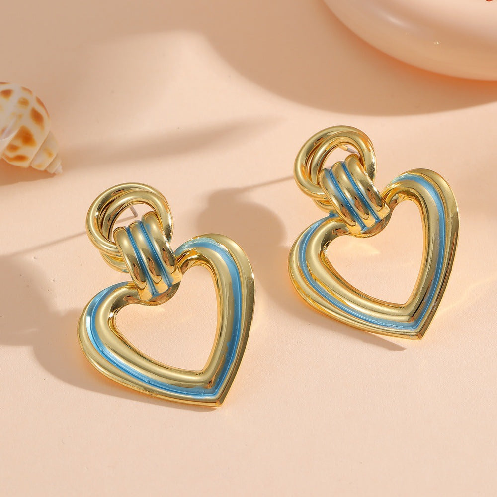 Women’s earrings in modern heart design