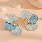 Women's ear clips in elaborate floral pattern
