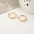 Women's hoop earrings with modern, textured design