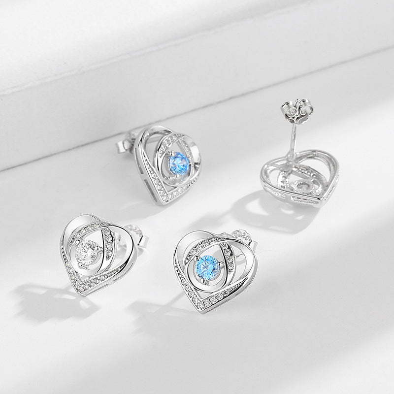 Women's earrings in elegant heart design with sparkling zirconia
