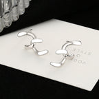 Women's earrings with sparkling circle pendant