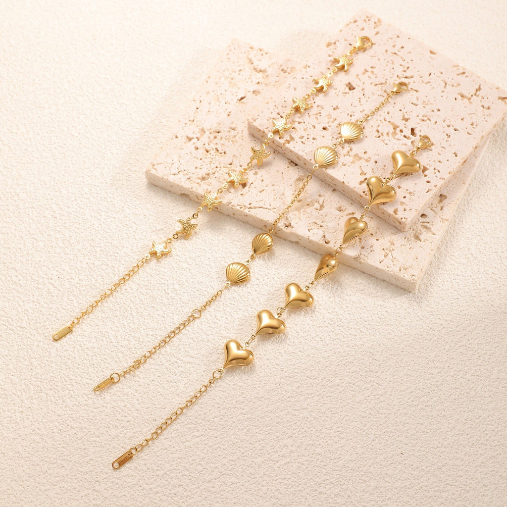 Ladies' bracelet with elegant heart design and fine link chain