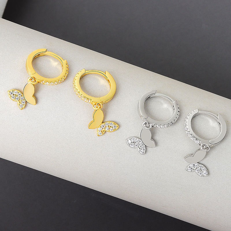 Ladies earrings with elegant butterfly design and sparkling details