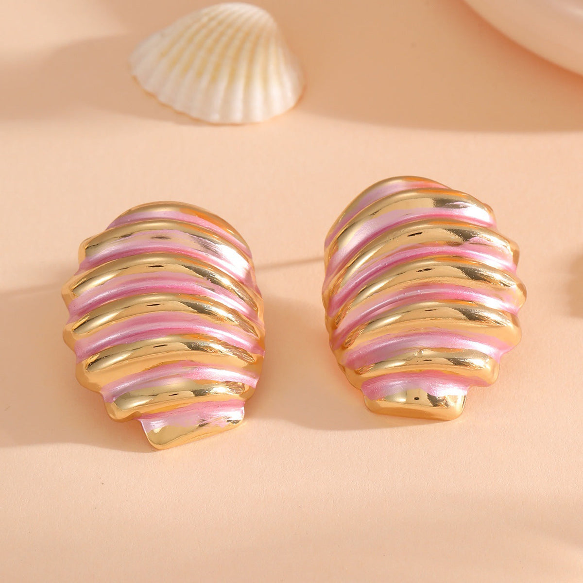 Women's ear clips in maritime shell design