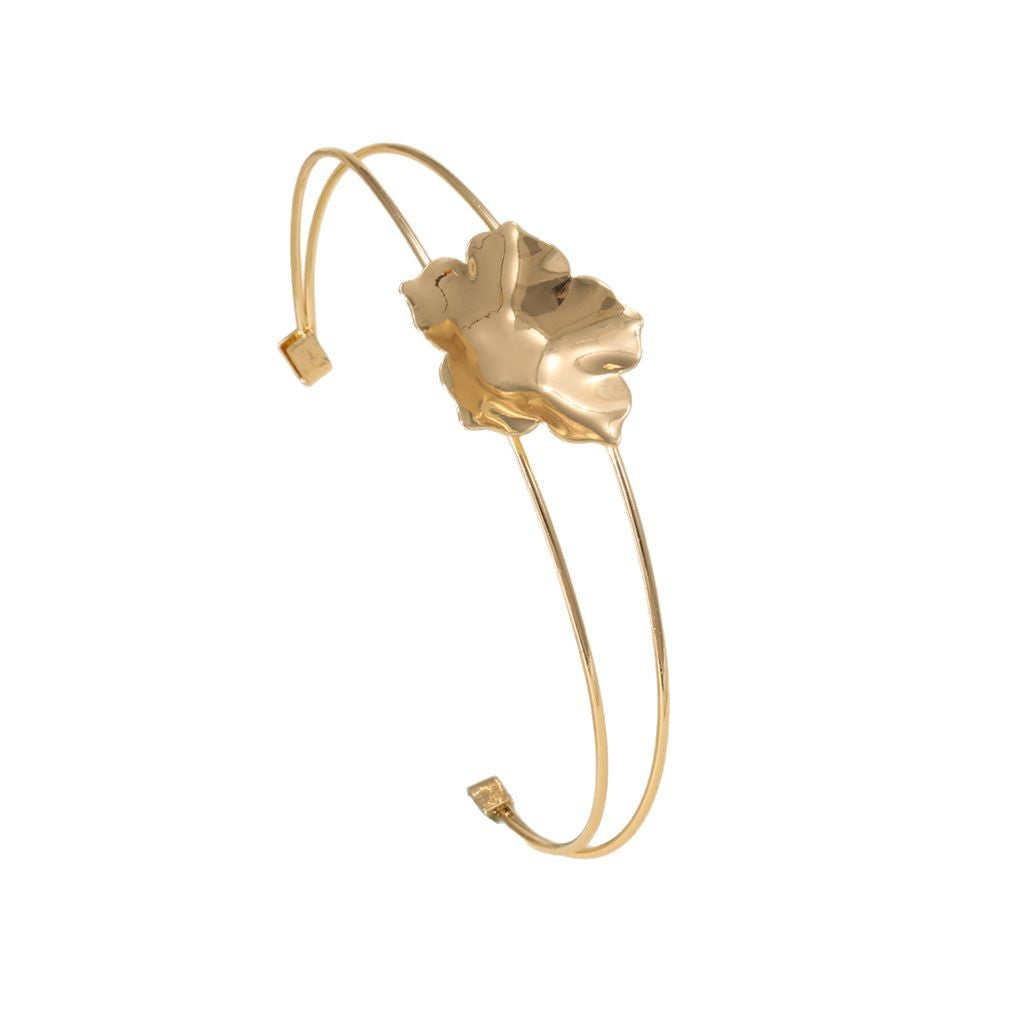 Women's cuff bracelet with artistic leaf motif