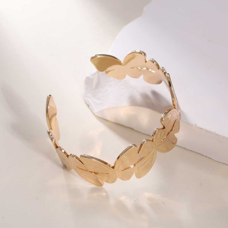 Women's Open Bangle with Elegant Wave Design