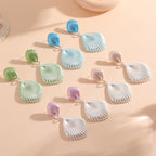 Ladies Hanging Earrings in Elegant Shell Design