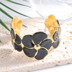 Ladies cuff bracelet with elaborate flower pattern