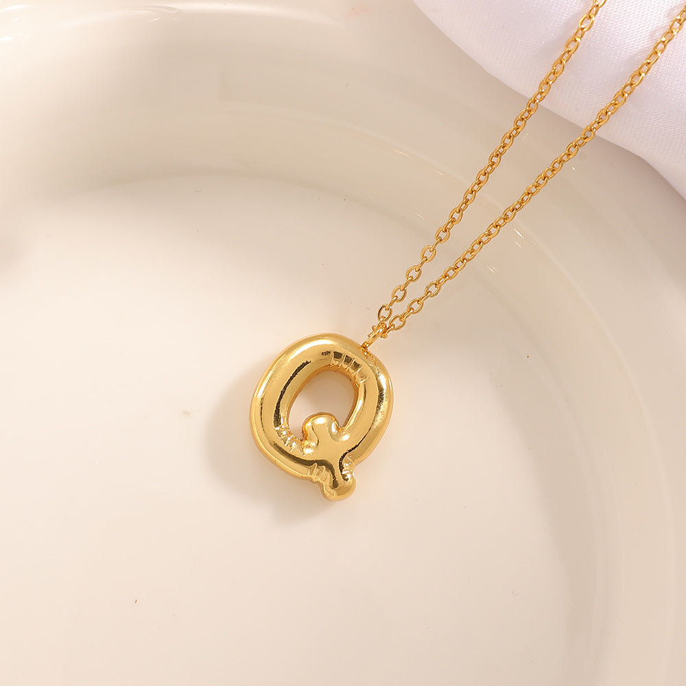 Women's necklace with curved letter pendant