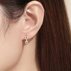 Ladies earrings with sparkling zirconia and modern design