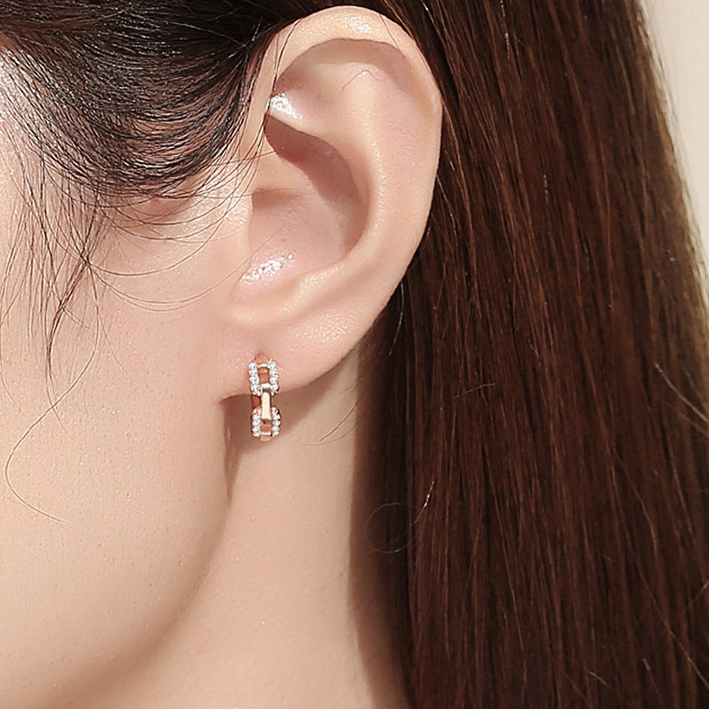 Ladies earrings with sparkling zirconia and modern design