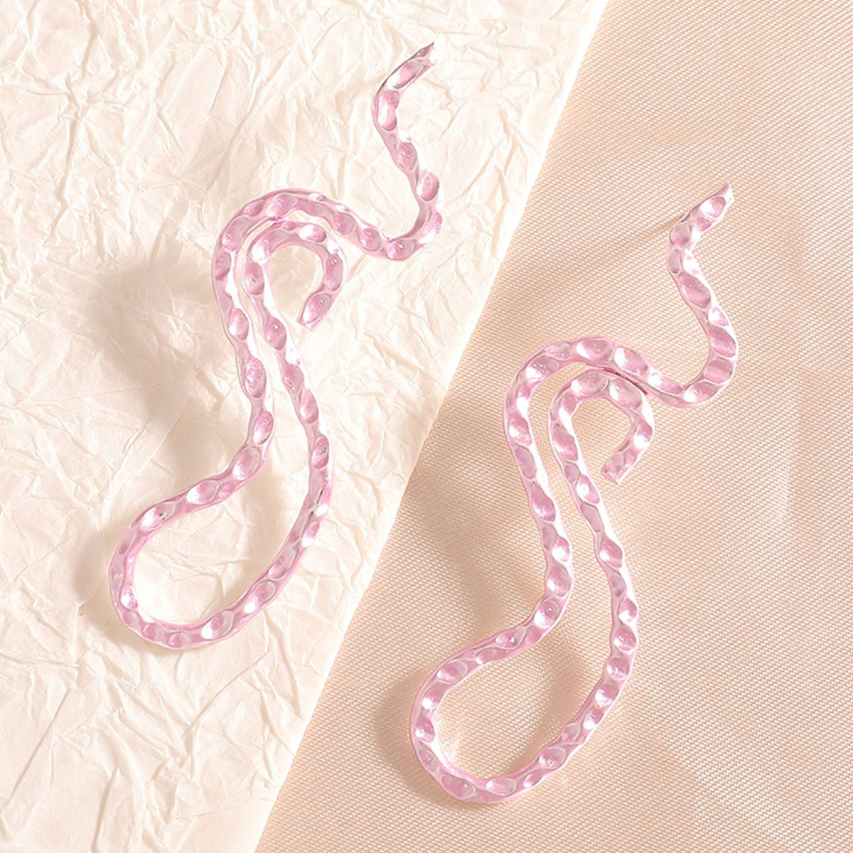 Ladies earrings in elegant wave pattern