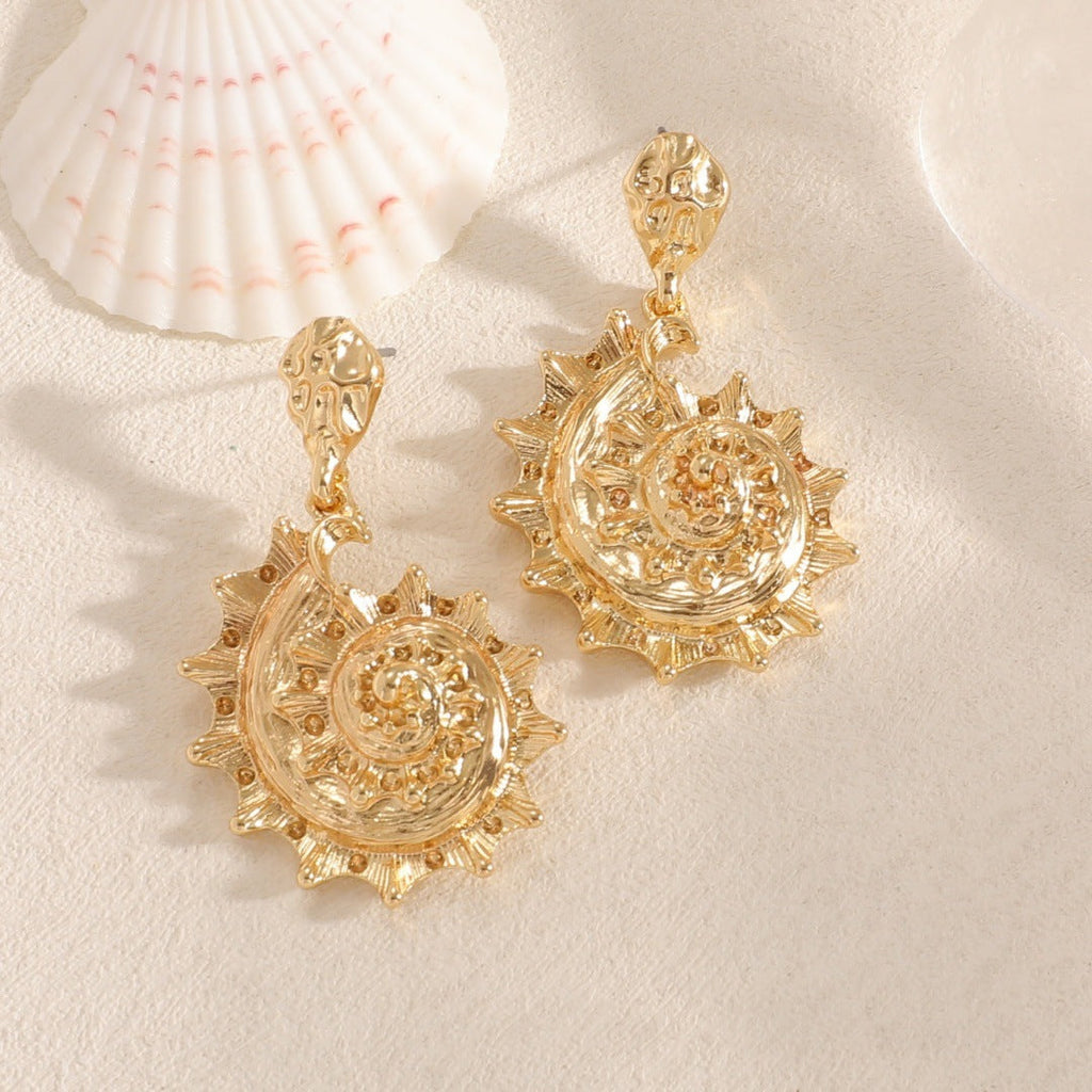 Ladies earrings in shell design