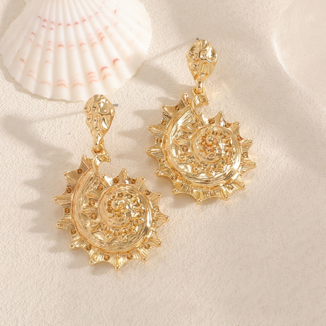 Ladies earrings in shell design