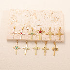 Ladies cross pendant with heart-shaped design and sparkling accents