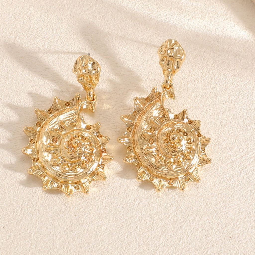 Ladies earrings in shell design