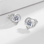 Ladies earrings in elegant heart design with shimmering zirconia