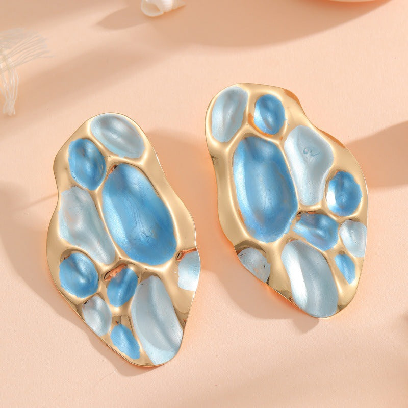 Ladies ear clips with elaborate, colorful shell design