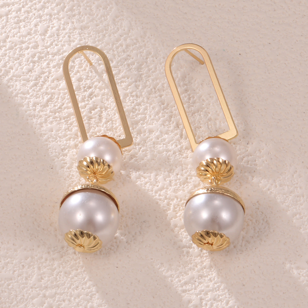 Ladies earrings with elegant pearl design